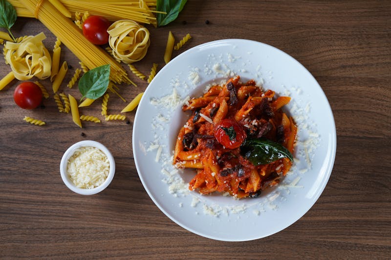 Spicy penne arrabbiata with roasted garlic and chili